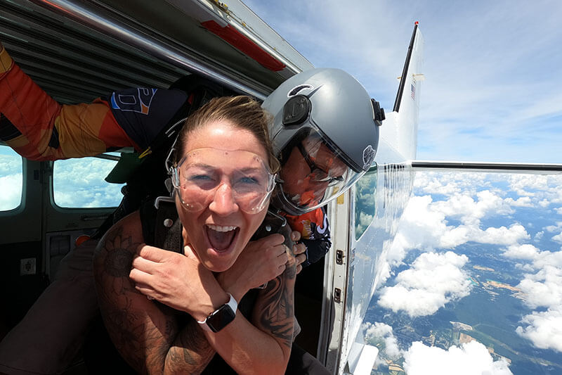 tandem skydiving exit smile